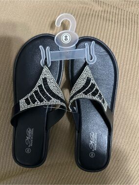 Black rhinestones flip flops